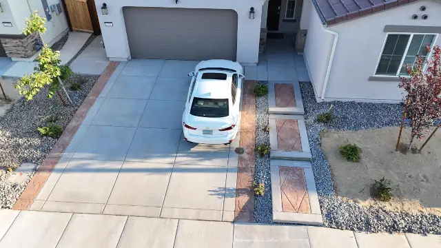 photo of a custom replacement concrete driveway at a home by Reno Tahoe Concrete